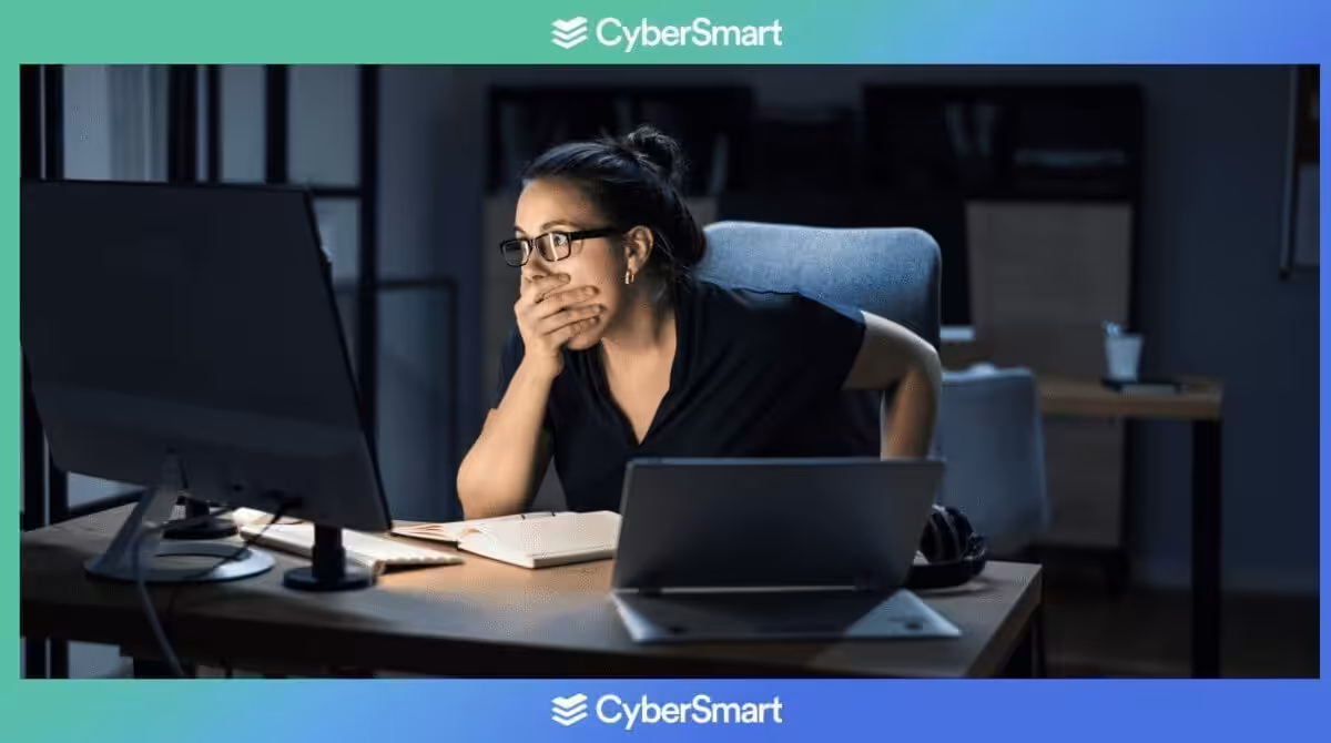 Shocked female discovering a ransomware attack on her business